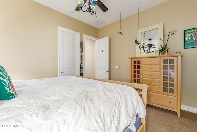 bedroom featuring ceiling fan and carpet floors