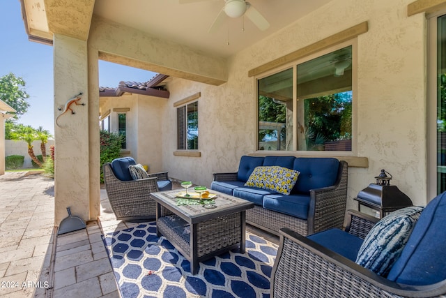 view of patio featuring outdoor lounge area and ceiling fan