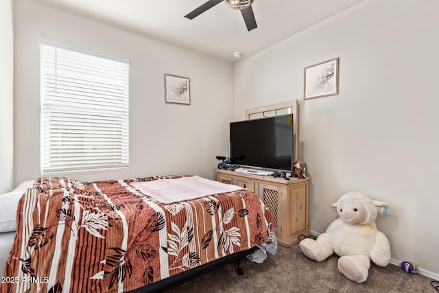 bedroom with ceiling fan and carpet flooring