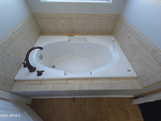 bathroom featuring a garden tub