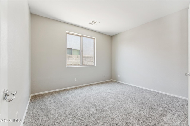 3310 W Chambers St, Phoenix, AZ 85041 - carpeted spare room featuring baseboards