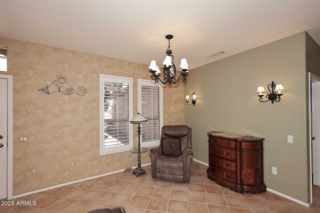 17630 N Somerset Dr, Surprise, AZ 85374 - living area with a chandelier, baseboards, and tile patterned floors