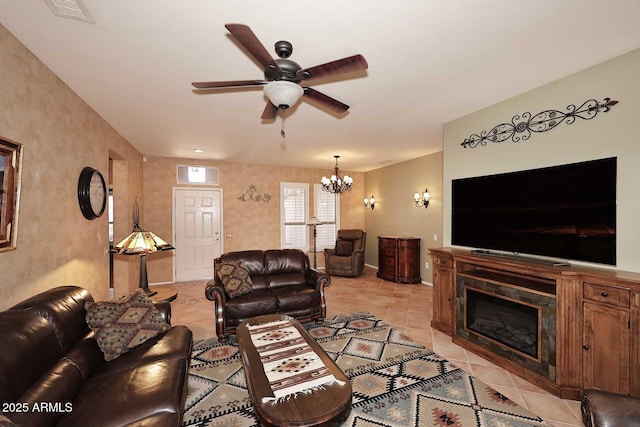17630 N Somerset Dr, Surprise, AZ 85374 - living area with a ceiling fan, a chandelier, baseboards, a tiled fireplace, and light tile patterned flooring