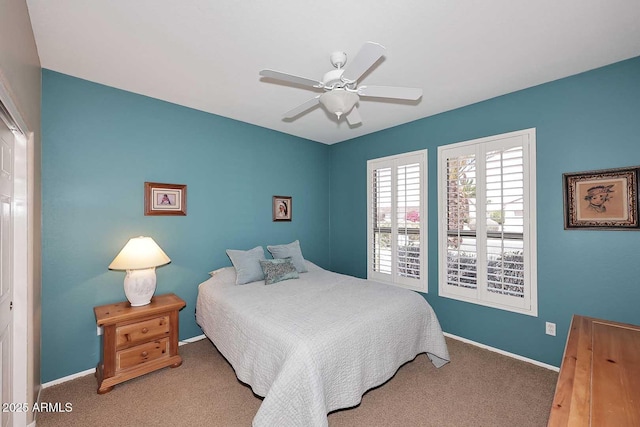 17630 N Somerset Dr, Surprise, AZ 85374 - bedroom with carpet floors, baseboards, and ceiling fan