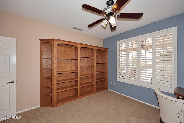 17630 N Somerset Dr, Surprise, AZ 85374 - unfurnished office with a ceiling fan, carpet, and baseboards
