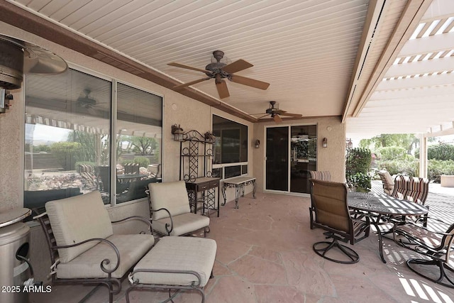 17630 N Somerset Dr, Surprise, AZ 85374 - view of patio / terrace with a ceiling fan, outdoor dining area, and a pergola