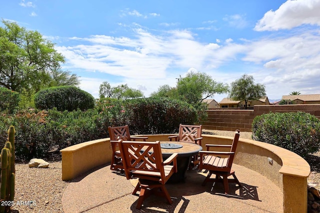 17630 N Somerset Dr, Surprise, AZ 85374 - view of patio / terrace with fence and a fire pit
