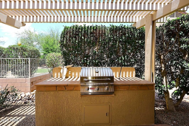 17630 N Somerset Dr, Surprise, AZ 85374 - view of patio featuring area for grilling, fence, and a pergola