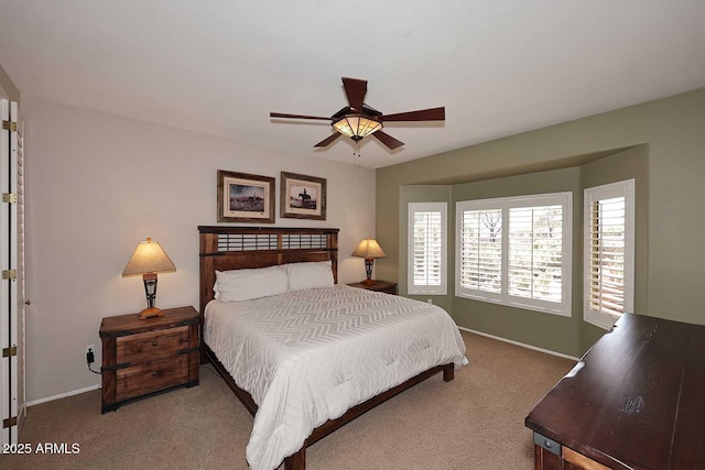 17630 N Somerset Dr, Surprise, AZ 85374 - carpeted bedroom with baseboards and ceiling fan