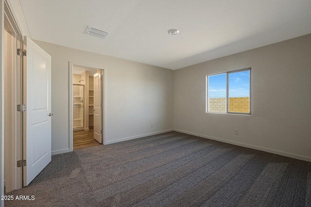 551 S W Virginia Ave, Florence, AZ 85132 - unfurnished bedroom featuring carpet floors and baseboards
