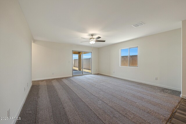 551 S W Virginia Ave, Florence, AZ 85132 - spare room with ceiling fan, baseboards, and carpet floors