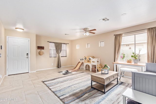 living room with ceiling fan