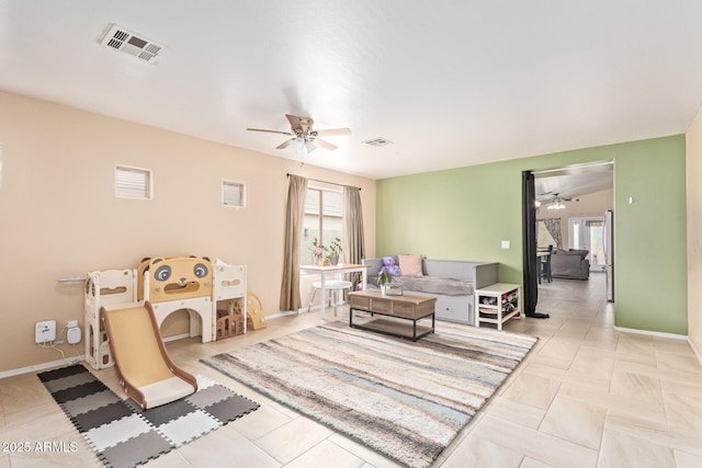 living room with ceiling fan