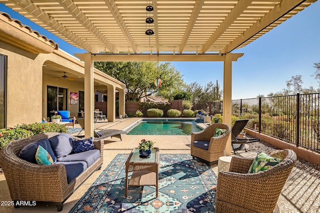 view of patio / terrace with a fenced in pool, a ceiling fan, a fenced backyard, outdoor lounge area, and a pergola