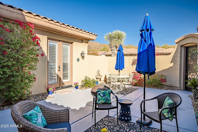 view of patio / terrace with fence