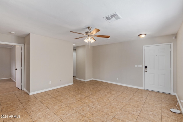 spare room featuring ceiling fan