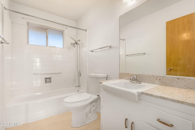 full bathroom featuring vanity, toilet, and tiled shower / bath