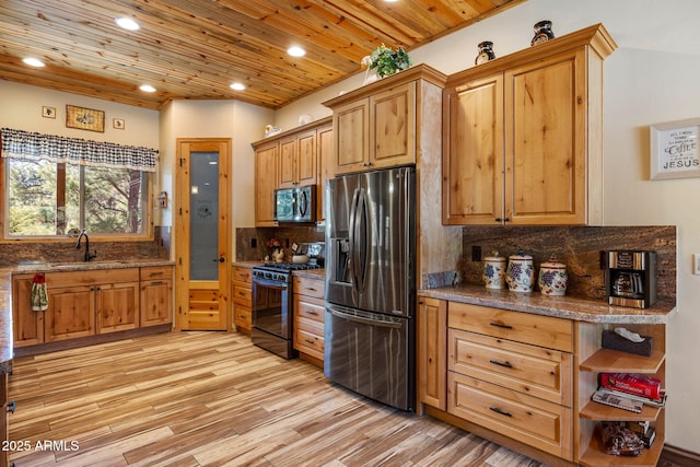 2352 Immelman Cir, Overgaard, AZ 85933 - kitchen with stainless steel fridge with ice dispenser, black gas range, a sink, recessed lighting, and open shelves