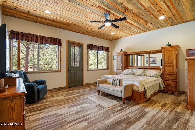 2352 Immelman Cir, Overgaard, AZ 85933 - bedroom featuring light wood-type flooring, recessed lighting, baseboards, wood ceiling, and a ceiling fan