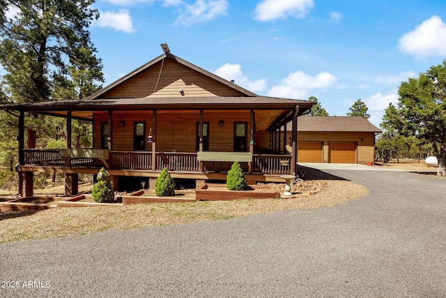 2352 Immelman Cir, Overgaard, AZ 85933 - chalet / cabin with covered porch and driveway