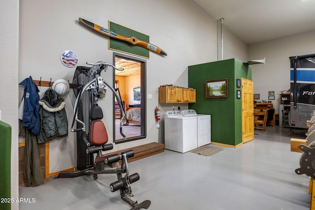 2352 Immelman Cir, Overgaard, AZ 85933 - exercise room featuring washing machine and clothes dryer