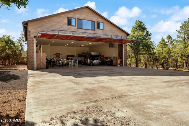 2352 Immelman Cir, Overgaard, AZ 85933 - view of side of home with concrete driveway