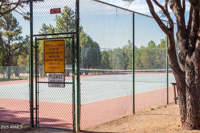 2352 Immelman Cir, Overgaard, AZ 85933 - view of tennis court featuring a gate