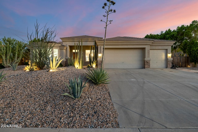 view of front of home with a garage