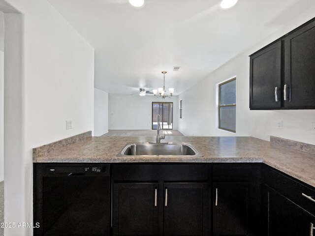 1953 W Stage Driver St, Apache Junction, AZ 85120 - kitchen featuring black dishwasher, dark cabinetry, a peninsula, and light countertops
