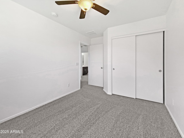 1953 W Stage Driver St, Apache Junction, AZ 85120 - unfurnished bedroom with carpet, a closet, and ceiling fan
