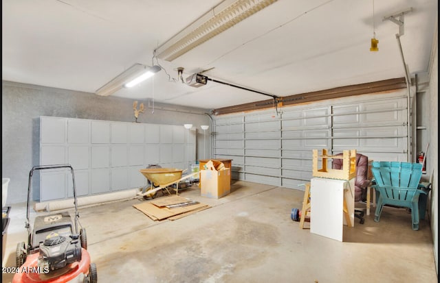 garage featuring a garage door opener