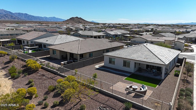 birds eye view of property featuring a residential view and a mountain view