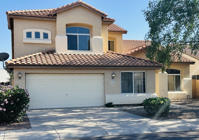 6923 W Laredo St, Chandler, AZ 85226 - mediterranean / spanish home with driveway, stucco siding, a tile roof, and a garage