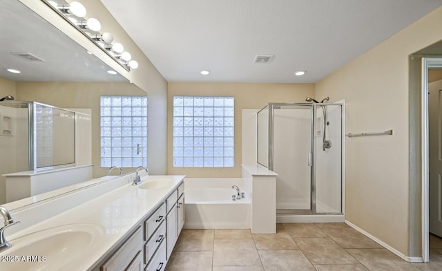 6923 W Laredo St, Chandler, AZ 85226 - full bathroom with a bath, a shower stall, double vanity, tile patterned flooring, and recessed lighting