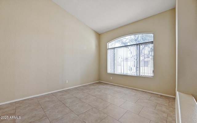 6923 W Laredo St, Chandler, AZ 85226 - unfurnished room with light tile patterned floors and lofted ceiling
