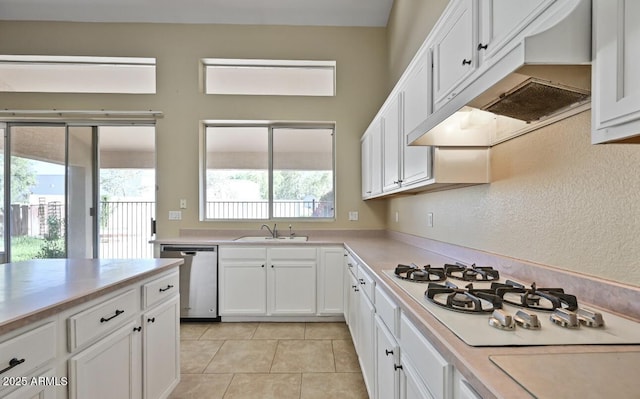 6923 W Laredo St, Chandler, AZ 85226 - kitchen with stainless steel dishwasher, exhaust hood, white gas cooktop, and white cabinetry