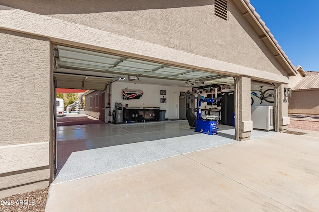 garage with driveway