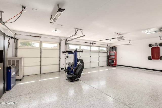 garage featuring a garage door opener