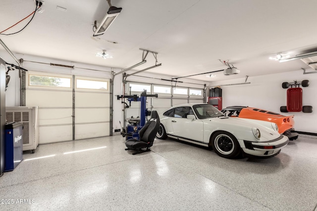 garage featuring a garage door opener