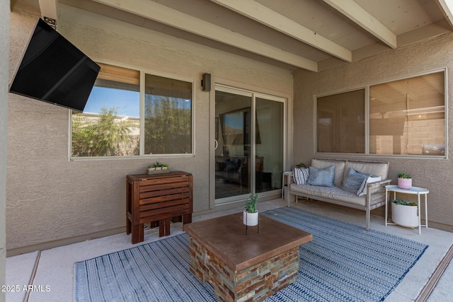 exterior space featuring an outdoor hangout area