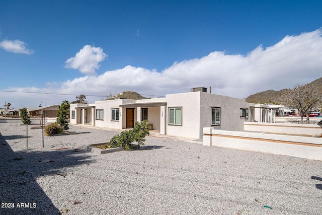 view of front of house with a mountain view