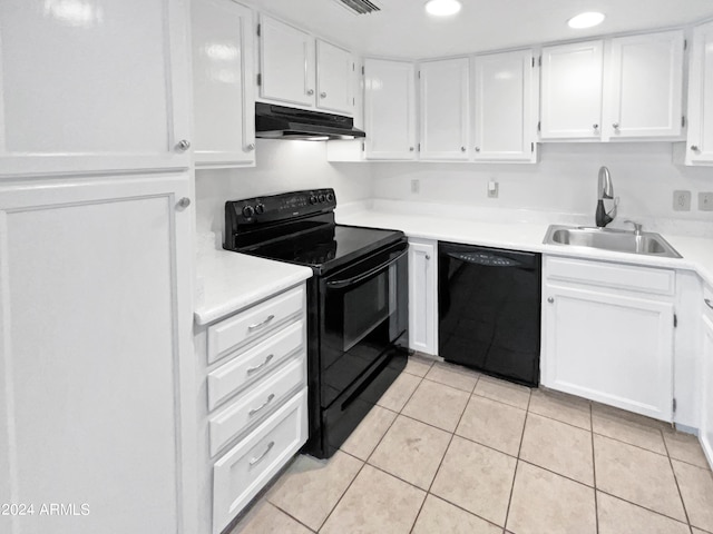 kitchen with black appliances, under cabinet range hood, a sink, white cabinets, and light tile patterned floors