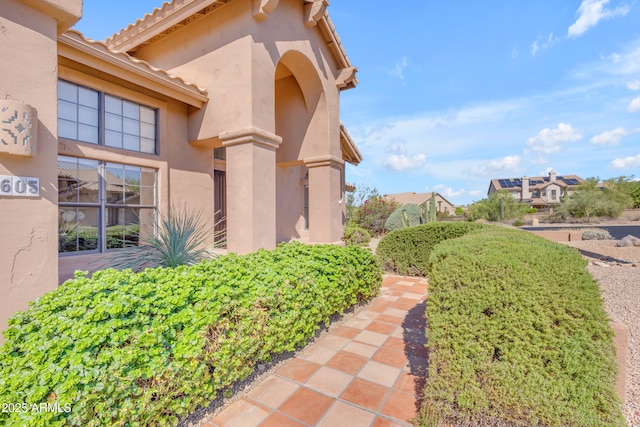 12605 E Kalil Dr, Scottsdale, AZ 85259 - view of home's exterior with stucco siding and a tiled roof