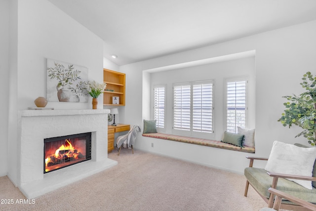12605 E Kalil Dr, Scottsdale, AZ 85259 - sitting room with a fireplace, light colored carpet, and lofted ceiling
