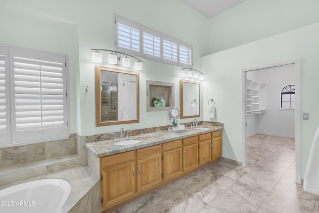 12605 E Kalil Dr, Scottsdale, AZ 85259 - full bath with double vanity, a garden tub, and a shower