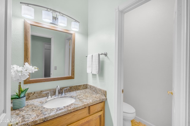 12605 E Kalil Dr, Scottsdale, AZ 85259 - half bathroom featuring vanity and toilet