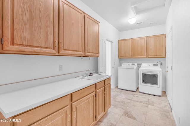 12605 E Kalil Dr, Scottsdale, AZ 85259 - washroom featuring cabinet space, washing machine and clothes dryer, and attic access