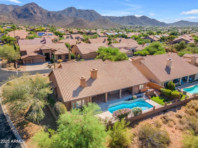 12605 E Kalil Dr, Scottsdale, AZ 85259 - aerial perspective of suburban area featuring a pool area and a mountain backdrop