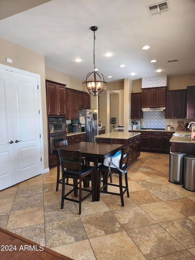 dining room featuring an inviting chandelier