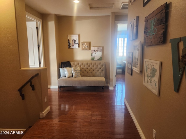 hallway with dark wood-type flooring